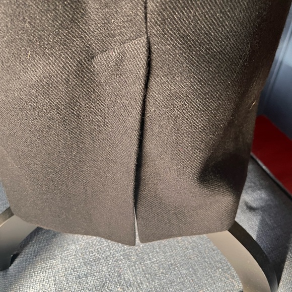 BLack wool like skirt. Lined. Fitted. I believe it says size 5! - Picture 5 of 5